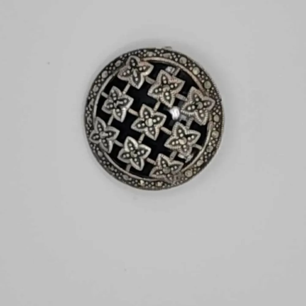 Vintage sterling silver black onyx marcasite brooch